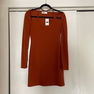 Burnt orange colored mini long sleeve dress